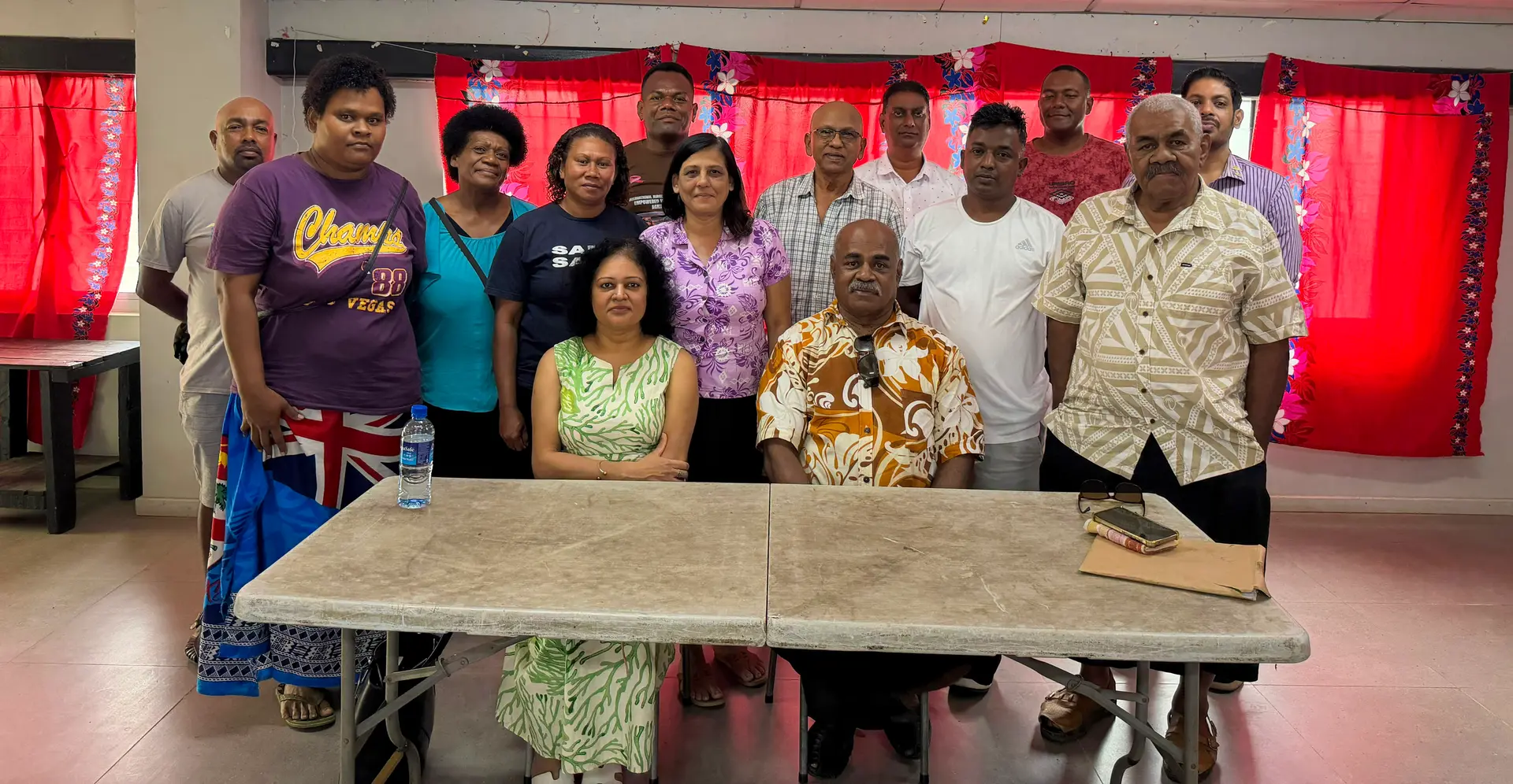  From left (first row sitting): Pacific Islands Development Forum Secretary - General, Ms Arpana Pratap, Rakiraki Town Council Chairman of the Special Administrator, Mr Peni Duaniwai with farmers, exporters, and businesspersons after the stakeholder meeting in Rakiraki.