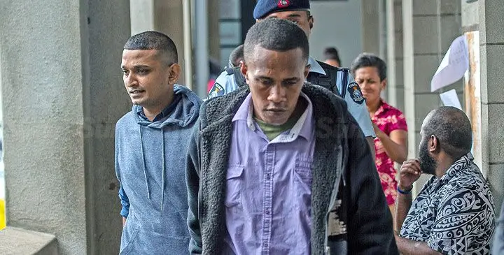 Edward Nand and Salimoni Lagicere after their sentencing at the High Court in Suva on March 7. Photo: Leon Lord