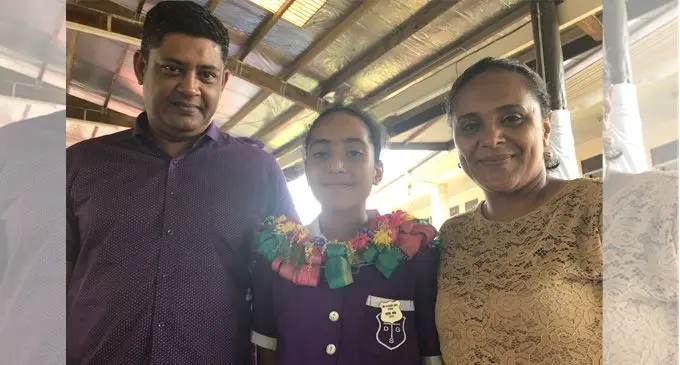 Dilkusha Girls School headgirl Grace Ali flanked by parents Zulfikar Ali (father) and Virisila Ali (mother). Photo: Rosi Doviverata