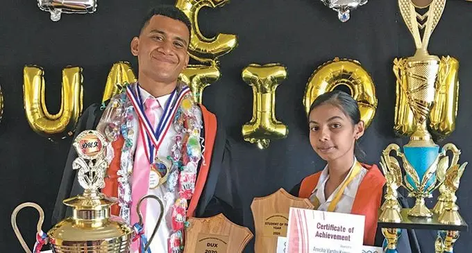 Maharishi Sanatan College dux Ratu Peni Meo with Student of the Year award winner Amisha Kumar on December 2, 2020. Photo: Waisea Nasokia