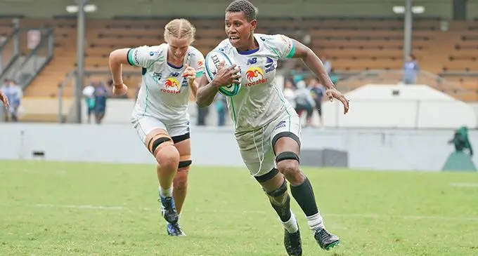 Powerful Rooster Chicken Fijiana flanker Teresia Tinanivalu (with ball) runs in to score her second try against Force with lock Jade Coates in support in their Super W clash at Leichhardt Oval in Sydney, Australia, on March 19, 2022. Photos: Fijiana Drua