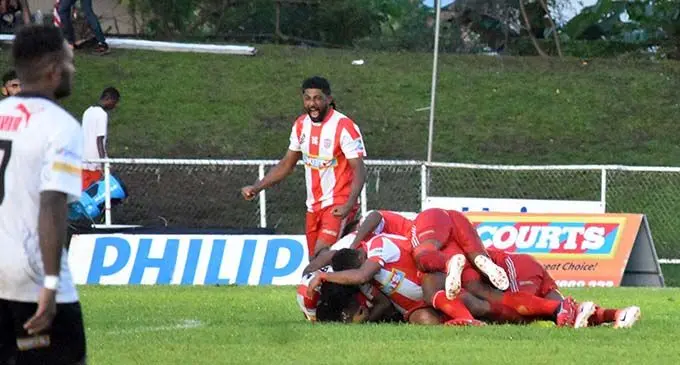 Labasa football team celebrates their first goal against Suva in the Courts IDC at the Prince Charles Park in Nadi last night. Photo: WAISEA NASOKIA