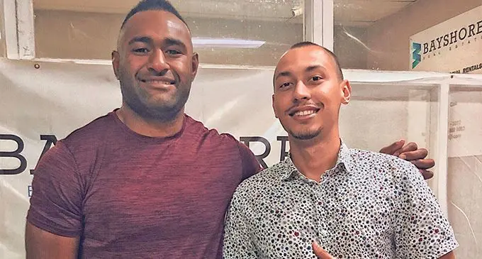Brumbies outside centre Tevita Kuridrani (left) and Bayshore Fiji Nadi team leader Nathaniel Khan at the Bayshore Fiji Nadi office on May 16, 2019.