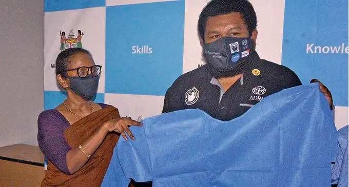 Ministry of Education Heritage and Arts Permanent Secretary, Anjeela Jokhan (left) with ADRA Finance Director Bou Mawi following the PPE donation on 27, October 2021. Photo: Ronald Kumar.