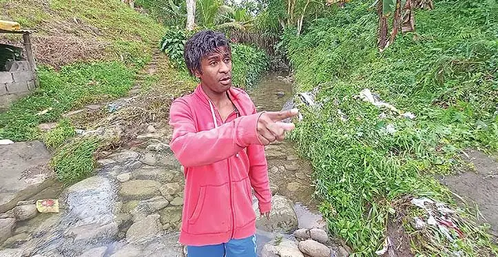 Marika Raleba showing where the victim was swept away. Photo: Ronald Kumar