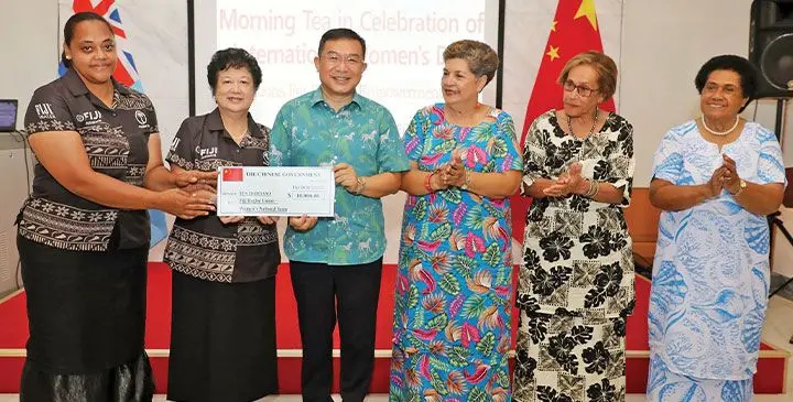 Fijiana Sevens Team received the cheque from the Chinese Government. Photo: Chinese Embassy, Fiji