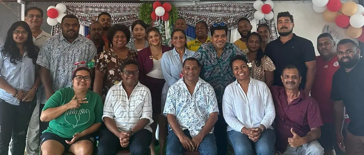 iji Media Association general secretary Stanley Simpson with members of West Media.