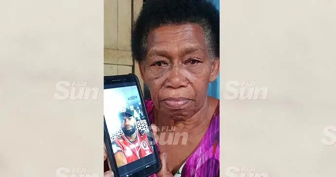 Sereana Kube shows a photo of her late son, Seru Ratudradra at her home in Tomuka, Lautoka. Photo: Nicolette Chambers