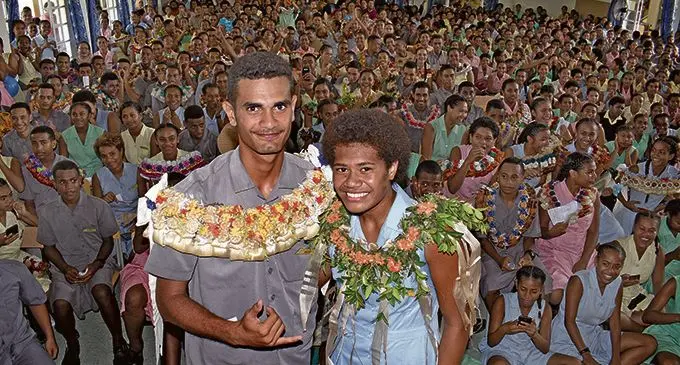 Suva Grammar School headboy Luke Seruwaqa (left), and headgirl Keleti Tikotani with the 2018 school prefects following their induction ceremony on February 20, 2018.  Photo: Ronald Kumar