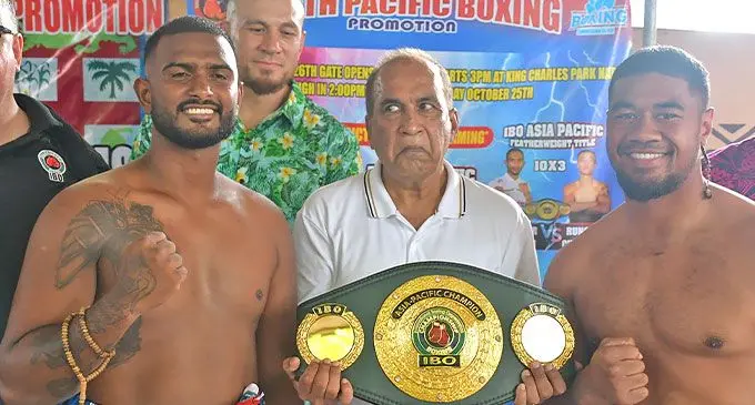 Sebastian Singh (left) and Tonga Tongotongo during the weigh-in with Mohammed Shameem (middle) while Sonny Billy Williams look on. Photo: Waisea Nasokia