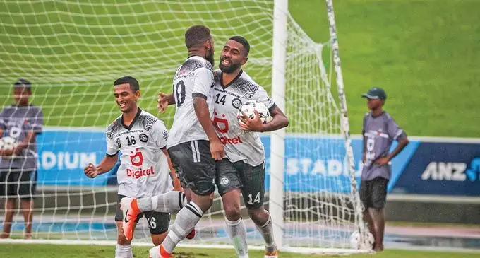 Sharma’s Investment Suva players (left-right) Shahil Dave, Marlon Tahoia and Samuela Drudru celebrate after the win over Tailevu/Naitasiri at the ANZ Stadium, Suva, on March 6, 2022. Photo: Leon Lord