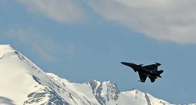 An Indian fighter jet soaring high above Ladakh.