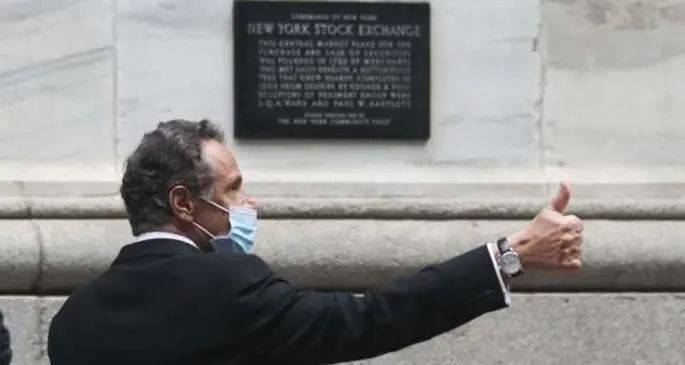 New York State Governor Andrew Cuomo arrives at the New York Stock Exchange in New York, the United States, on May 26, 2020. The New York Stock Exchange (NYSE) partially reopened its iconic trading floor on Tuesday after a two-month closure due to the COVID-19 pandemic. (Xinhua/Wang Ying)