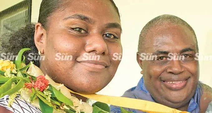 Jai Narayan College year 13 graduate Margaret Qalo with father, Joe Qalo following the graduation ceremony on March 16, 2022. Photo: Ronald Kumar