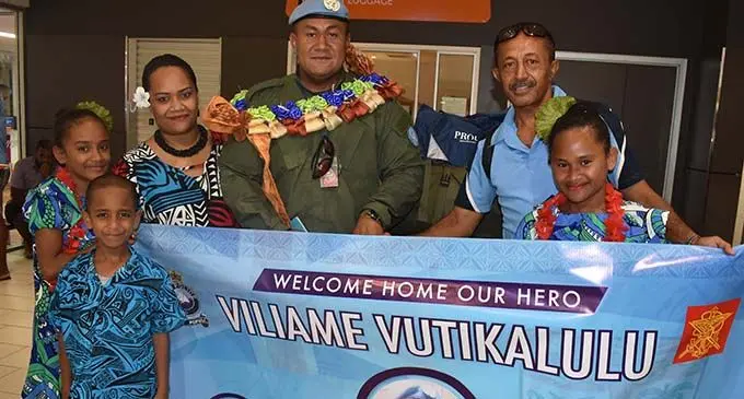 Private Viliame Vutikalulu with his family at the Nadi International Airport on November 1, 2019. Photo: Waisea Nasokia