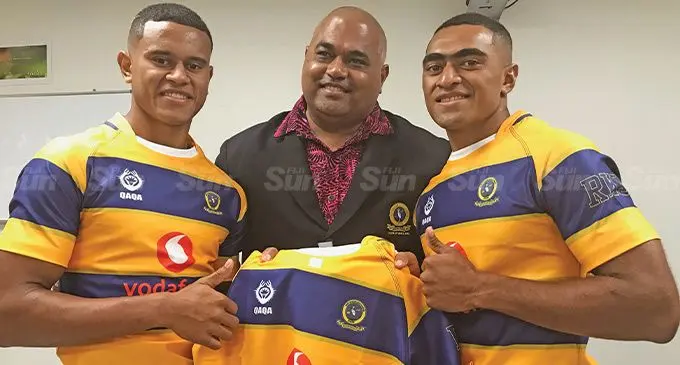 From left Ratu Kadavulevu School U18 captain Meli Wara, Poniani Nacagilevu (right) with principal Ilaisa Waqalala after receiving their jersey from Jacks of Fiji & Qaqa in Suva on September 9, 2022. Photo: Simione Haravanua.