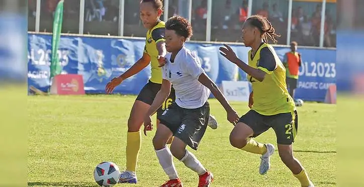 Fiji women’s football striker Cema Nasau tries to beat two Vanuatu defenders during their Sol2023 Pacific Games group opener at Lawson Tama Stadium in Honiara, Solomon Islands on November 21, 2023. Photo: Sereana Salalo