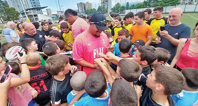 Flying Fijian forward Meli Tuni with players at the Georgia junior rugby festival in Batumi, Georgia on July 3, 2024. Photo: FRU Media