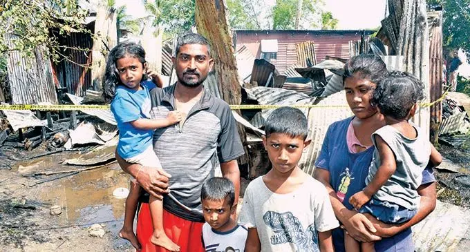 Apal Naidu with wife Moni Krishna and their four children Avia, Aahir, Arush and Advick Naidu after their home was destroyed in a fire at Nanuku Settlement in Vatuwaqa on October 28, 2021.. Photos: Ronald Kumar