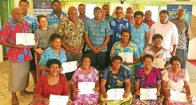 The Minister for Agriculture, Waterways and Environment, Dr Mahendra Reddy with Lauwaki villagers in Lautoka after receiving their Certificates of Participation in the Community-based Composting Training programme on November 13, 2020. Photo: Nicolette Chambers