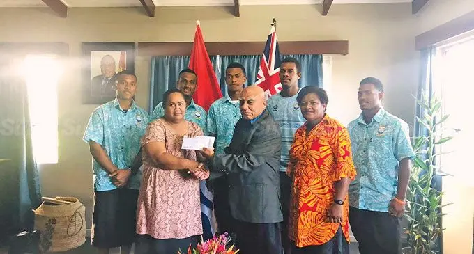 Back (from left): St Johns College headboy Petero Lawakeli, Shonal Butturu, Paulo Rokotutai and Nikola Raiviu. Front: (from left): Principal Mereana Kitolele, Kiribati High Commissioner Tebuai Uaai, Sitere Bulavakarua and Matia Bolai during the cash presentation on July 9, 2022. Photo: St Johns College