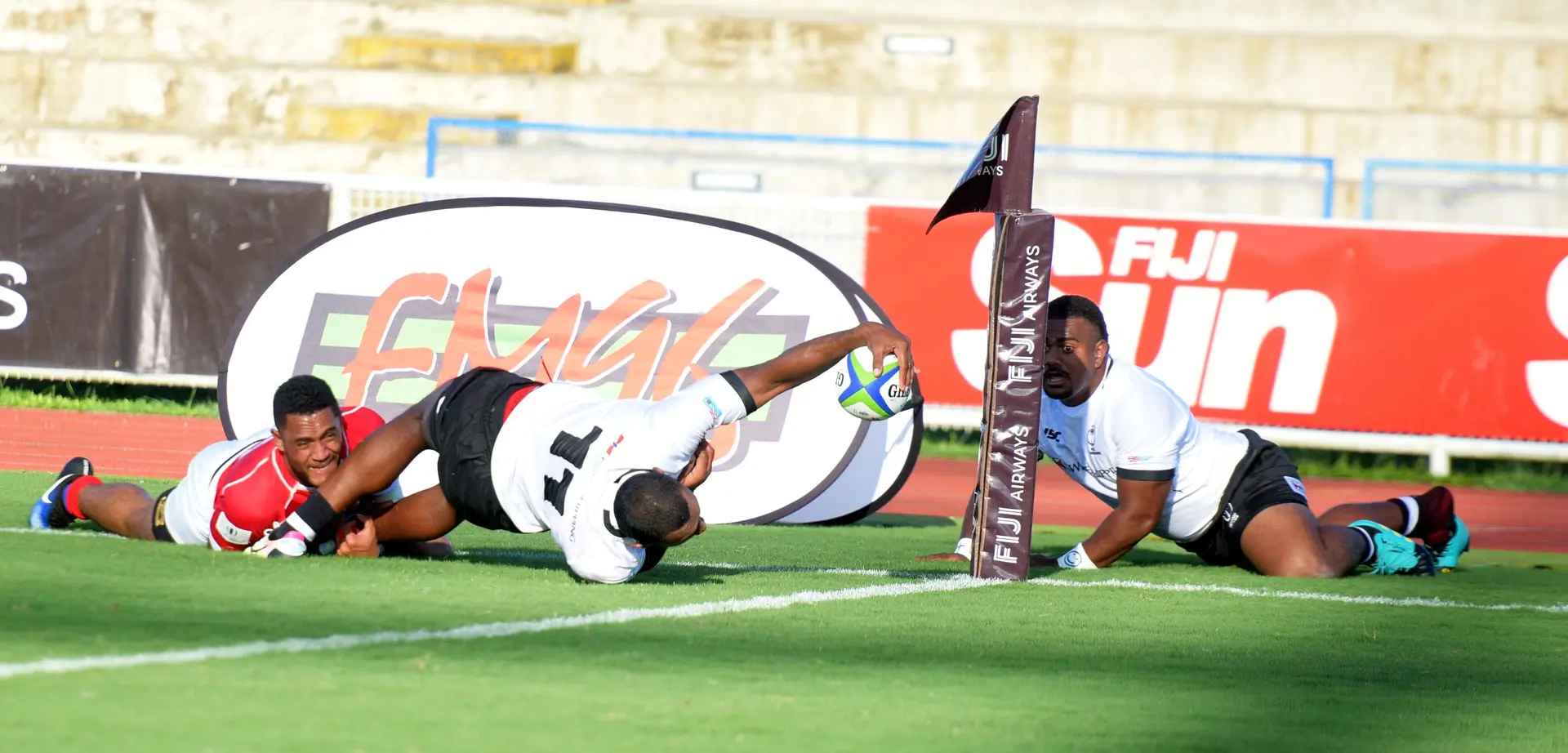 Fiji Warriors Tira Patterson reached out for try line as Mesulame Dolokoto looks on against Tonga during 2019 World Rugby Pacific Challenge at ANZ Stadium on March 8, 2019. Photo: Ronald Kumar.
