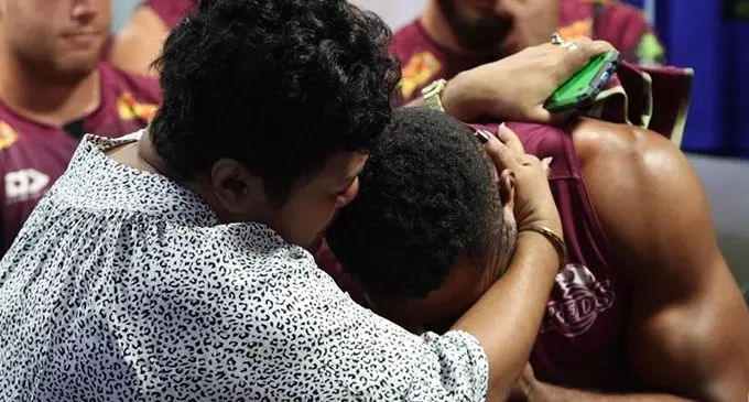 Litia Daugunu-Naiteqe hugs nephew Filipo Daugunu during his jersey presentation at Ballymore in Brisbane, Australia. Photo: Queensland Reds
