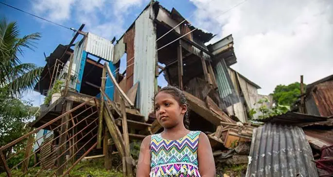 Neha Raj’s daughter, Tanshi Prasad in front of their home in Jittu Estate, Samabula, on February 2, 2021