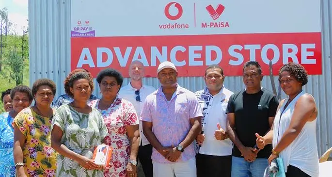 Sixth from left United Nations Capital Development Fund (UNCDF) regional leader Bram Peters, owner of Advanced Store Viliame Naqelevuki, Roko Tui Kadavu Kitione Raibevu, Head of Vodafone eCommerce and Corporate Affairs Shailendra Prasad and women from Vunisea’s Women’s Group in Biani, Vunisea, in Kadavu during the launch of the first MPAiSA QR Agent on February 20, 2021 Photo: Susana Hirst-Tuilau