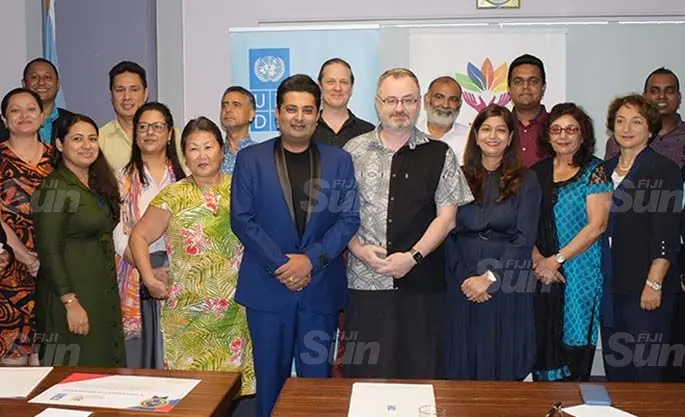UNDP Pacific Office in Fiji resident representative, Levan Bouadze and Sai Prema Foundation Fiji director, Sumeet Tappoo, with staff of UNDP and Sai Prema Foundation representatives following the MoU signing on July 9, 2020. Photo: Ronald Kumar