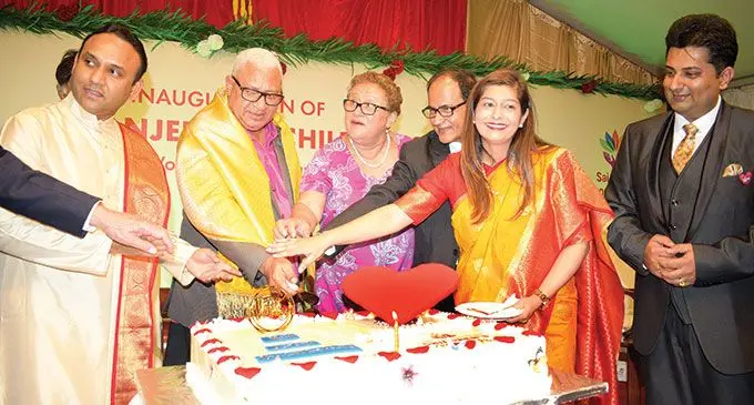 From left: Satguru Sri Madhusudan Sai, Prime Minister Voreqe Bainimarama, wife Mary Bainimarama, Chairman of Sai Prema Foundation Fiji, Mahendra Tappoo, and Directors Dr Krupali Tappoo and Sumeet Tappoo cut the ceremonial cake to mark the opening of the Sri Sathya Sai Sanjeevani Children’s Hospital on April 27, 2022.  Photo: Ronald Kumar
