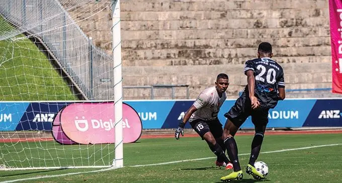 Rewa goalkeeper Mohammed Alam tries to block a goal attempt from Ba’s Etonia Dogolau during their Digicel Premier League match at the ANZ Stadium on December 12, 2021. Photo: Leon Lord