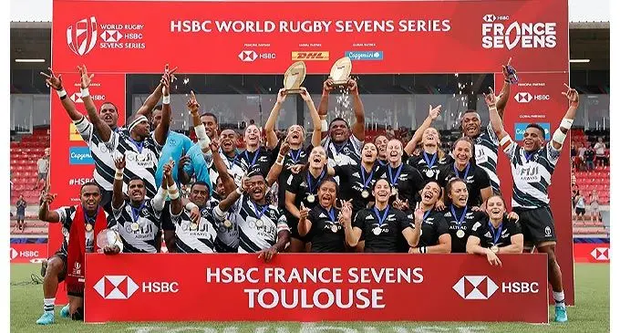 Fiji Airways Fijian 7s men's and the New Zealand women's players celebrate after winning their respective categories in the France Sevens tournament in Toulouse on May 22, 2022. Photo: World Rugby