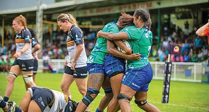 Rooster Chicken Fijiana Drua winger Laisani Moceisawana is mobbed by her team-mates after scoring a try against Brumbies at Prince Charles Park in Nadi on March 25, 2023. Drua won 12-7 as they defend the Super W title. Photo: Leon Lord