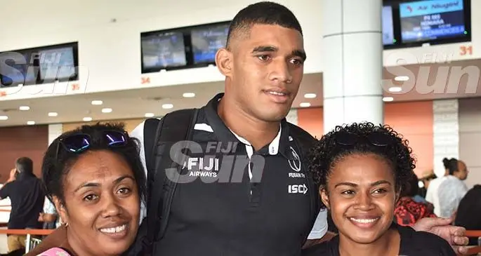 Fiji Airways Fijian 7s forward Meli Derenalagi with fans at the Nadi International Airport on January 20, 2020. Photo: Waisea Nasokia