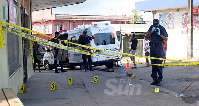 Police forensic team investigates the stabbing of women at the junction of Namuka and Fulaga Street in Samabula on December 4, 2019. Photo: Ronald Kumar.