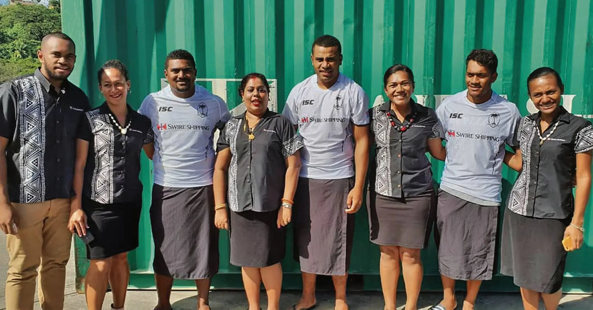 Inoke Malovesi (first from left) with staff of Swire Shipping and members of the Swire Shipping Fiji Warriors.