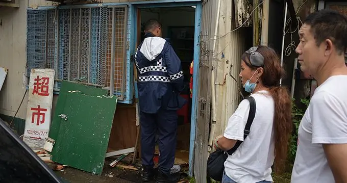 Police raided the shop located on the groundfloor, Sunshine Fishing PTE Ltd is located above.  Photo: Ronald Kumar