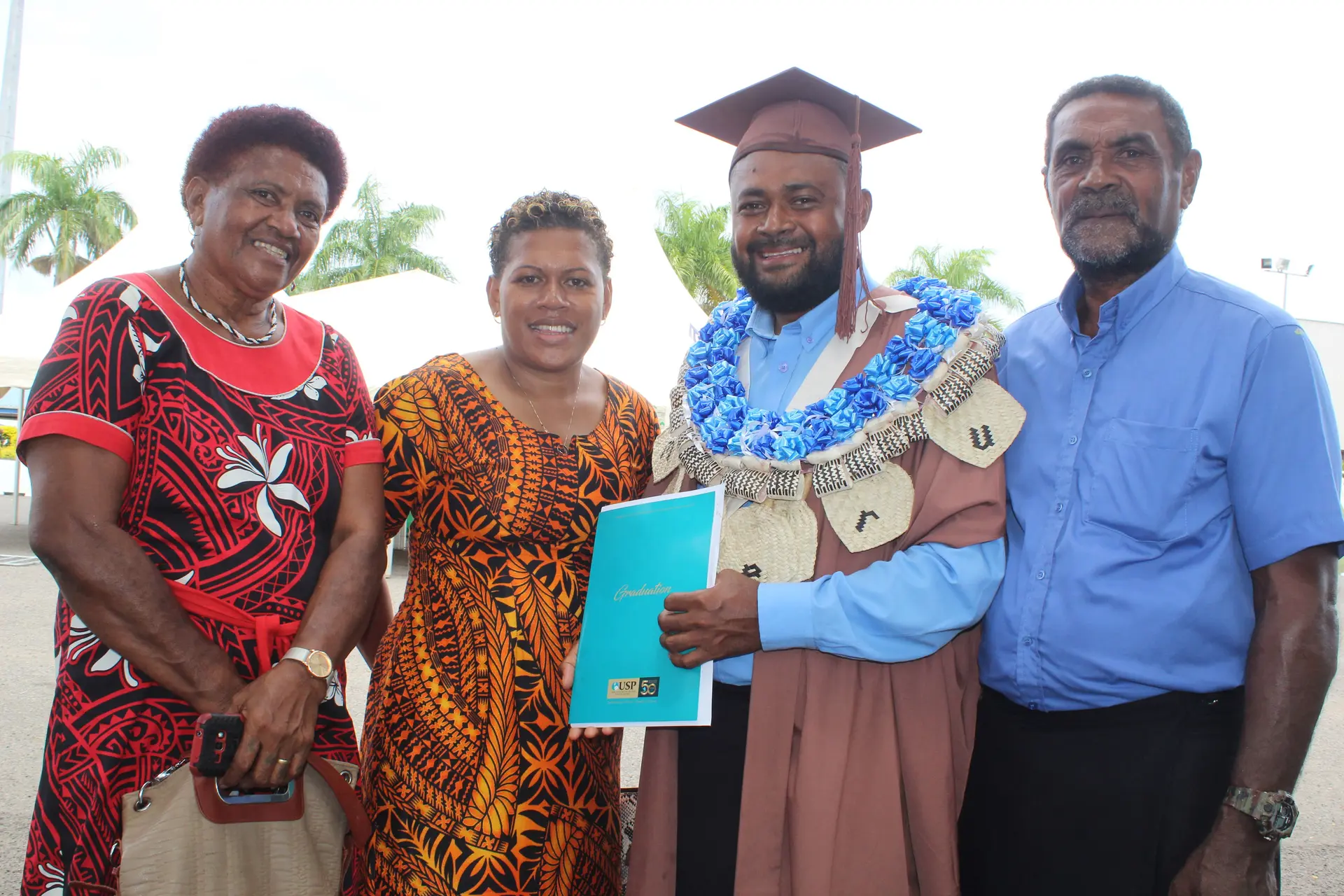 From left proud mother Sereana Macedru,Ro Vatea Macedru (wife),graduate Tomasi Macedru with father Sisa Macedru after the USP graduation on March 21,2019.Photo:Simione Haravanua.