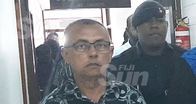 Mohammed Raheesh Isoof is escorted out of the High Court in Lautoka on November 5, 2019.Photo: Salote Qalubau