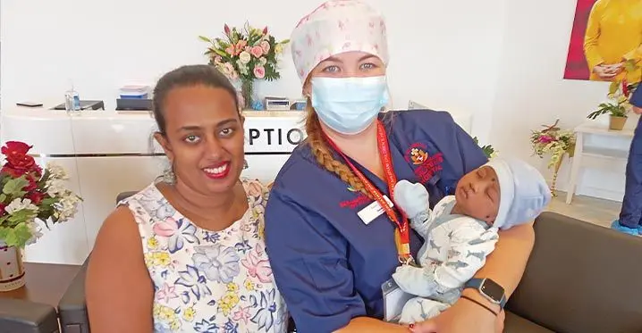 From left: Karishma Lal (mother) and one of New Zealand’s nurses, Sandi Mahar, and baby Jaitik Kumar. Photo: Josefa Babitu