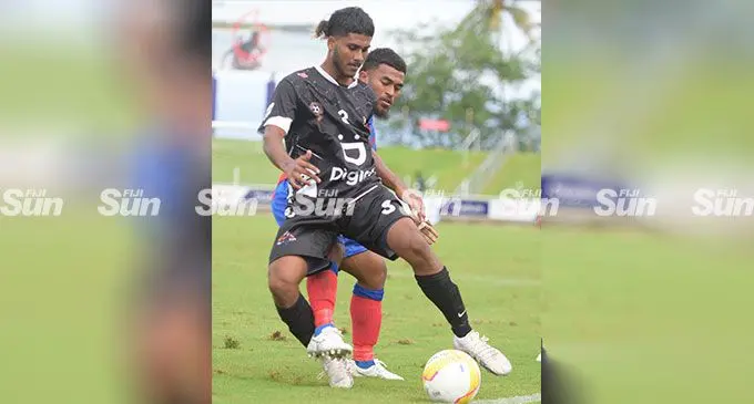 Ba's Mohammed Raheem shields the ball away from Navua striker Thomas Dunn during the Digicel Fiji FACT at the HFC Bank Stadium, Suva, on June 9, 2023. Ba won 2-1. Photo: Ronald Kumar.