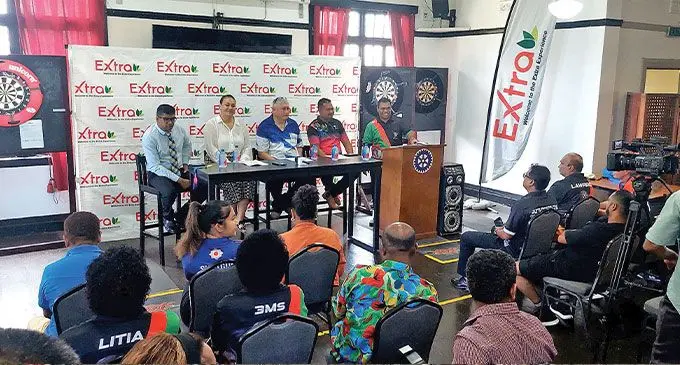 Extra Supermarket chief marketing officer Lailanie Burnes(second from left) and President of the Fiji Darts Association Edward Roxburg(third from left) and members during the sponsorship and team announcement on January 15, 2024. Photo: Fiji Darts Asssociation