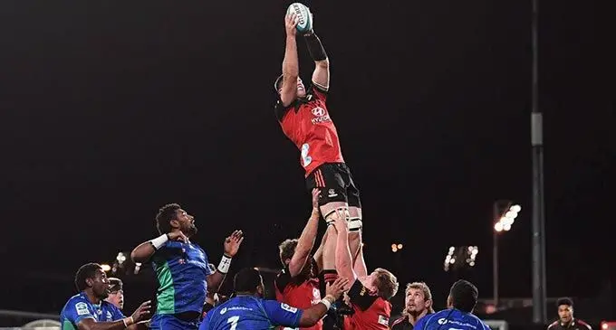 Crusaders lock Zach Gallagher takes a two-handed catch against the Swire Shipping Fijian Drua at Orangetheory Stadium in Christchurch, tonight. Photo: Stuff