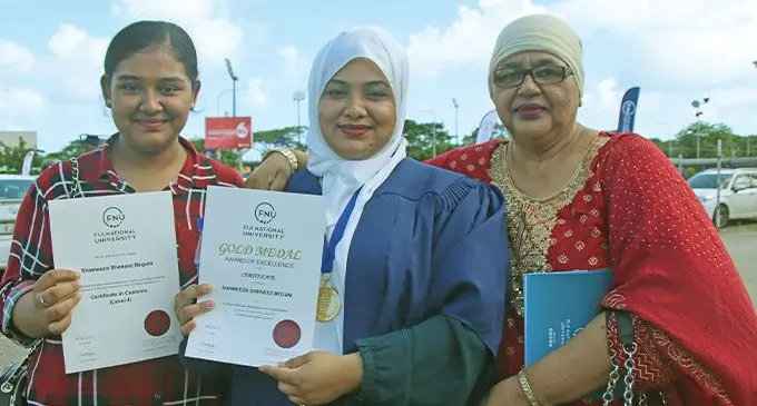 Gold medallist, Shameeza Begum (middle) flanked by sister Shakera Begum and mother Imran Begum at the Vodafone Arena in Suva on April 17, 2024. Photo by Kelera Tuisawau