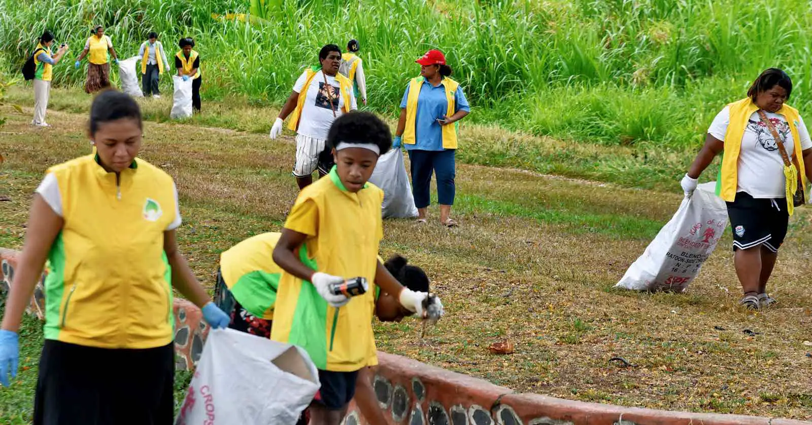Members of the Shincheonji Volunteer Team collect rubbish during a cleanup along Lautoka City roads on September 26.