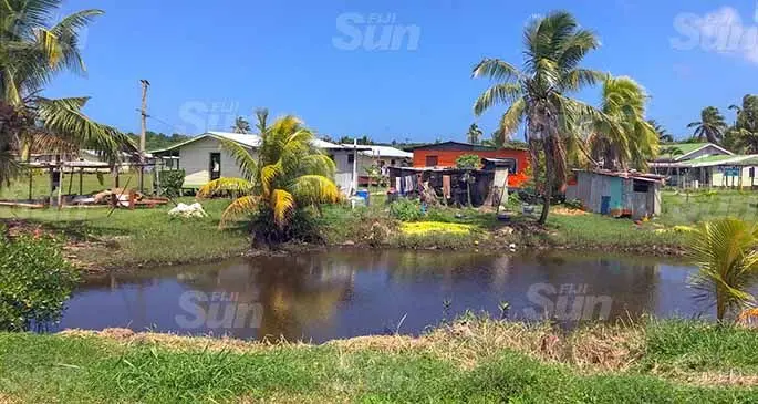 Daku villagers have been raising funds to buy soil to help fill in areas within the village that are inundated with water. Photo: Kelera Sovasiga
