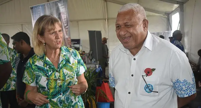 FNU Vice-Chancellor Professor Lyn Karstadt explaining Prime Minister Voreqe Bainimarama at the display booth at the FNU Open Day Nasinu Campus yesterday. Photo : FNU