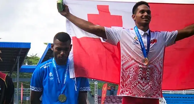 Fiji's Malakai Kaiwalu and Tonga's Mosese Foliaki at the podium. PHOTO: Rosi Doviverata