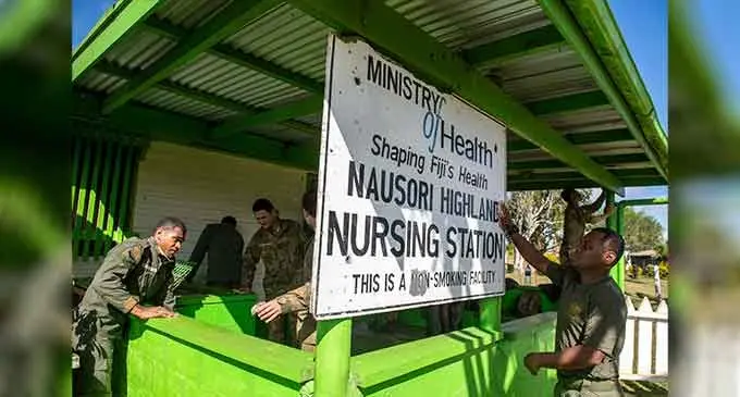 New Zealand personnel helping clean the medical centre at Nausori Village.